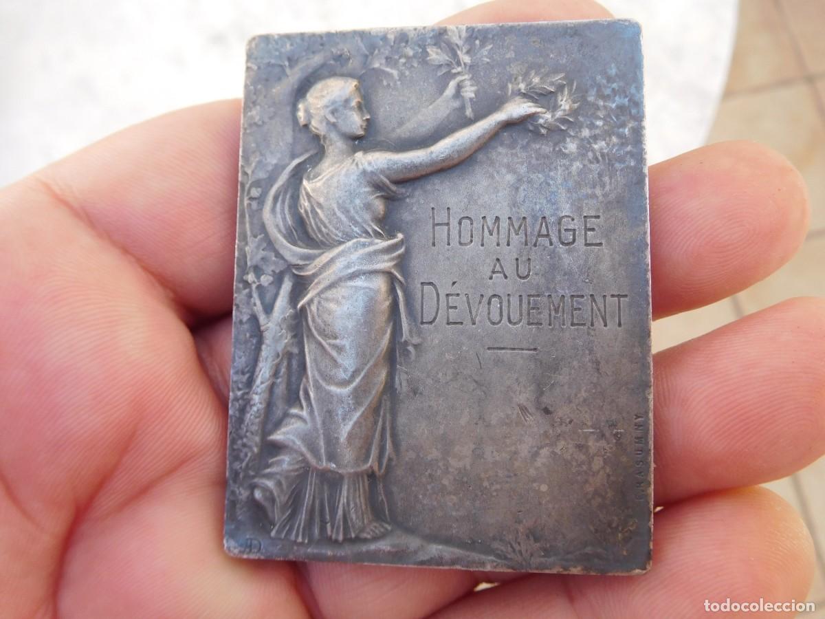 Medallas tem&aacute;ticas: Medalla de bronce plateado. Hommage au d&eacute;vouement 1922. F. Rasumny