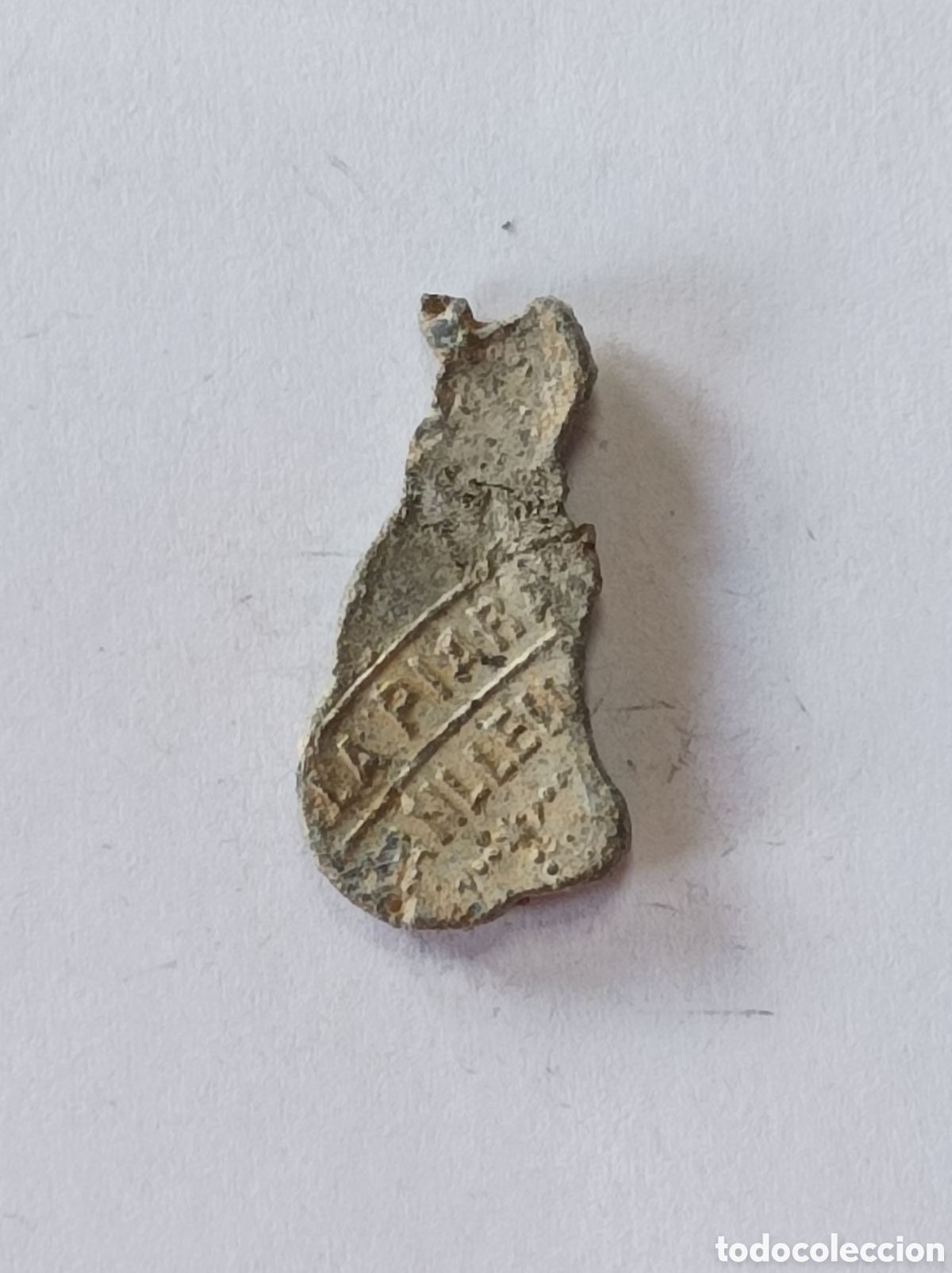 Medallas tem&aacute;ticas: LA PIARA. MANLLEU. ANTIGUO SELLO DE PLOMO O MARCHAMO. PATE PRECINTO.