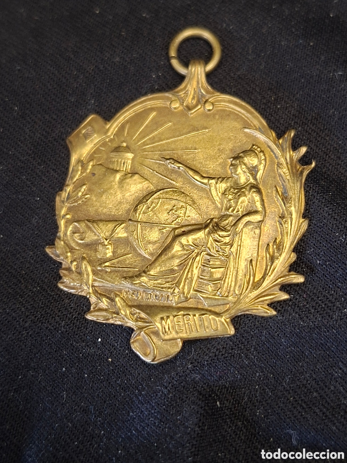 Medallas tem&aacute;ticas: medalla escolar o premio al m&eacute;rito de principios del siglo XX, fabricada en bronce o lat&oacute;n. MTC6