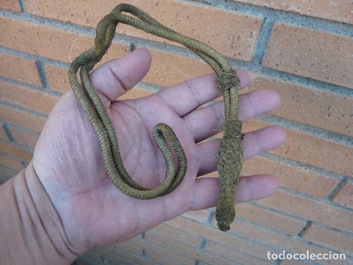 Militaria: ANTIGUO FIADOR DE OFICIAL DORADO PARA ESPADA SABLE