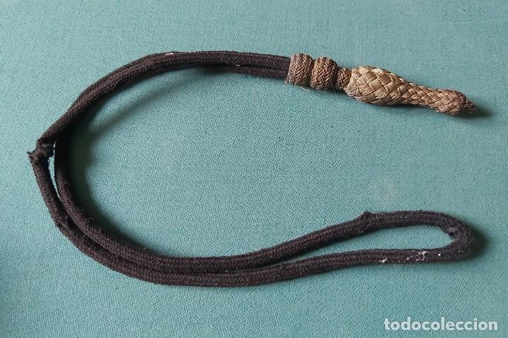Militaria: Fiador de sable - Foto 1