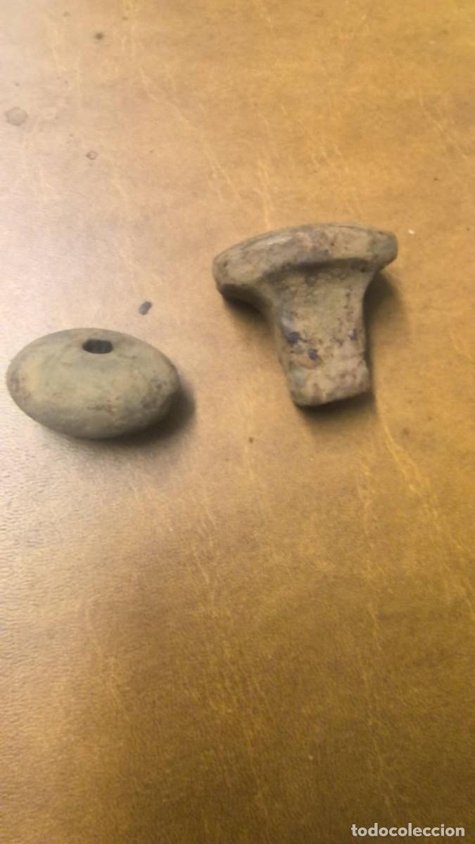 Militaria: 2 pomos s. XIX para espada o daga