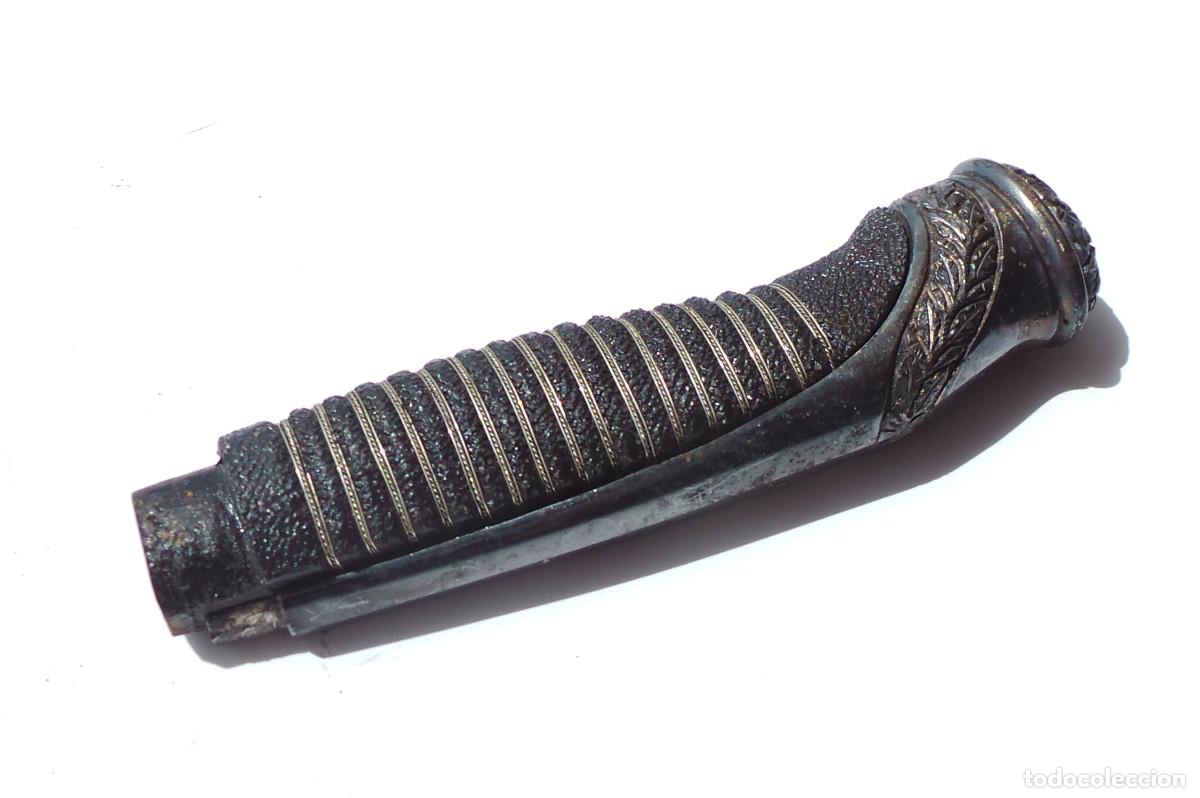 Militaria: ADORNO EMPU&Ntilde;ADURA PARA SABLE.