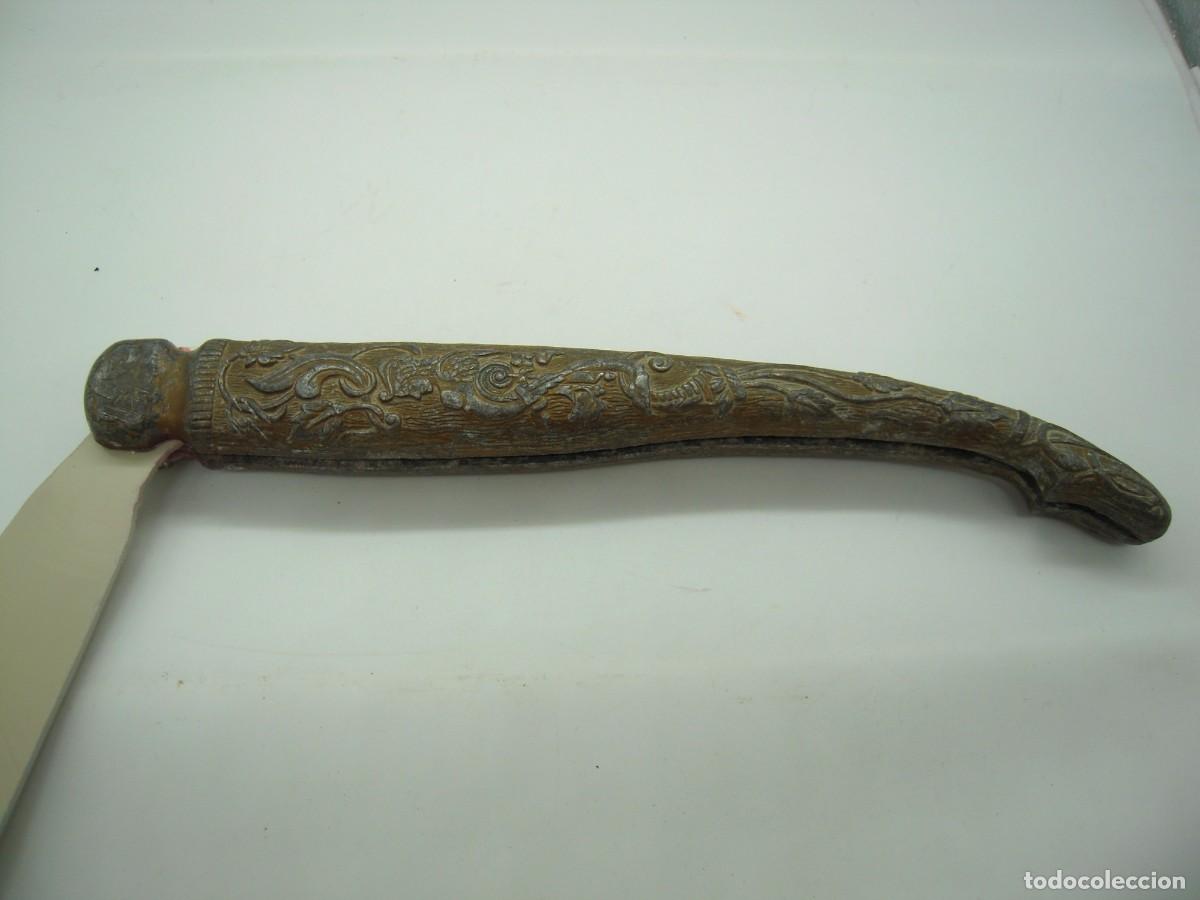 Militaria: antiguas cachas de navaja 30 cm bronce o similar muy trabajadas y elaboradas