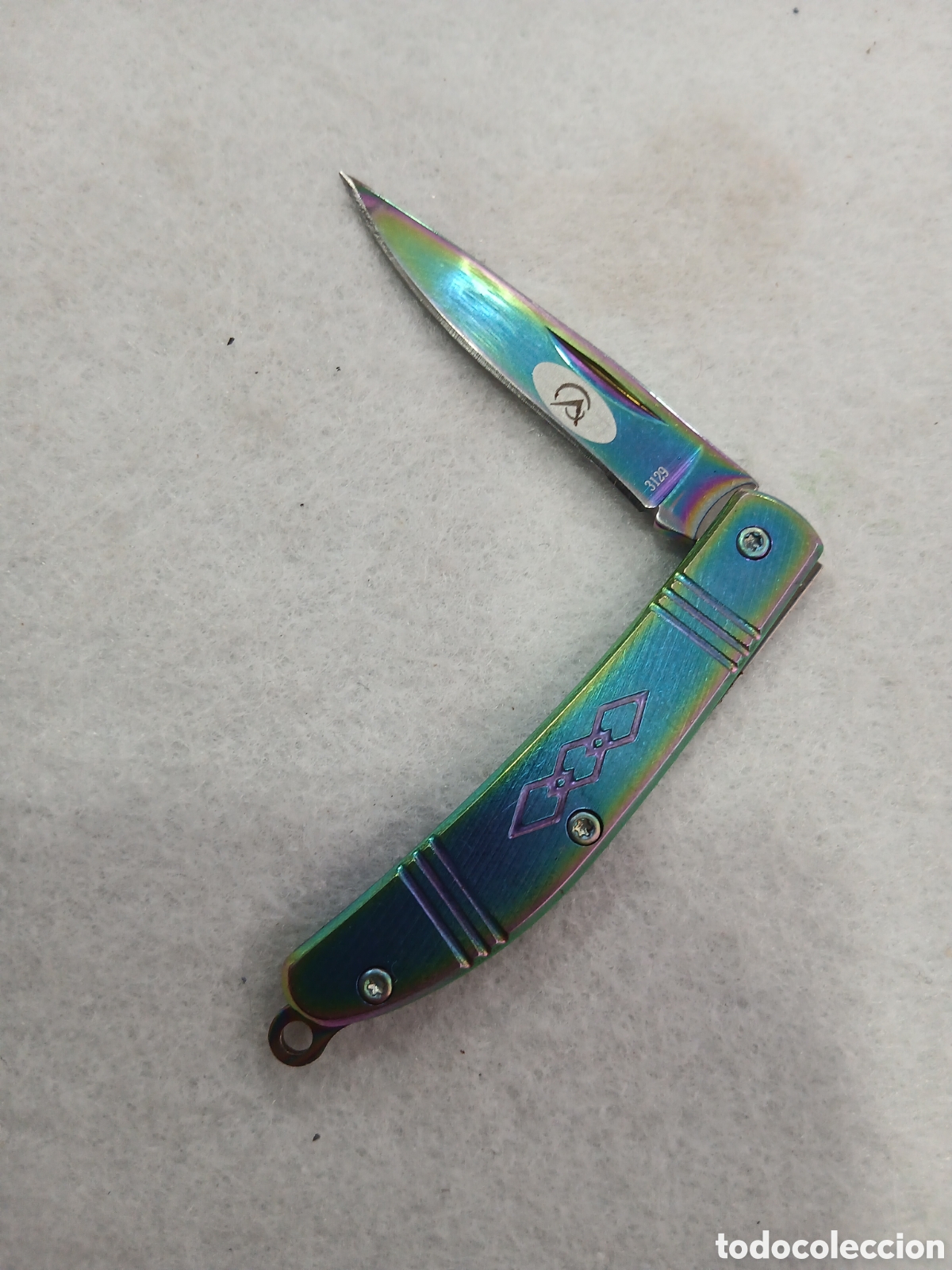 Militaria: Peque&ntilde;a navaja arcoiris. (L54) - Foto 1