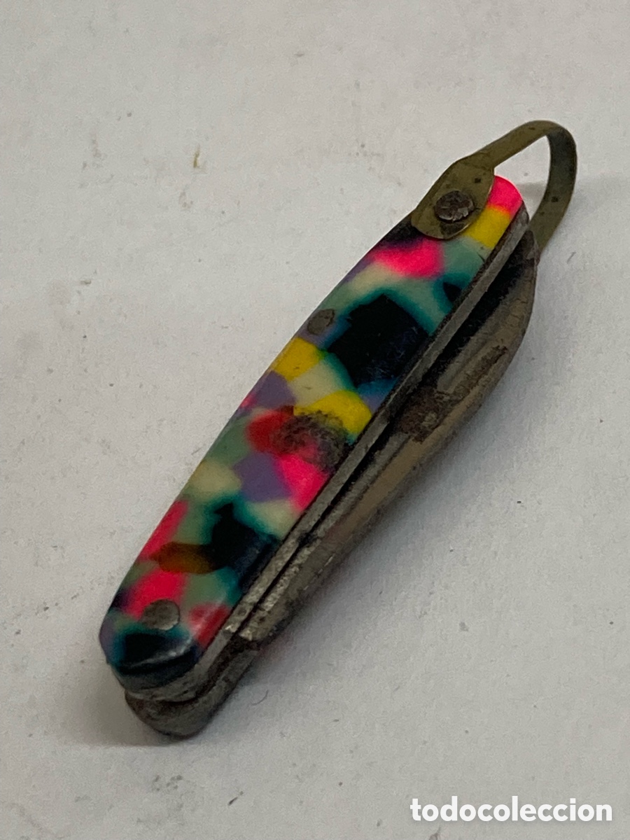 Militaria: Navaja miniatura mango resina