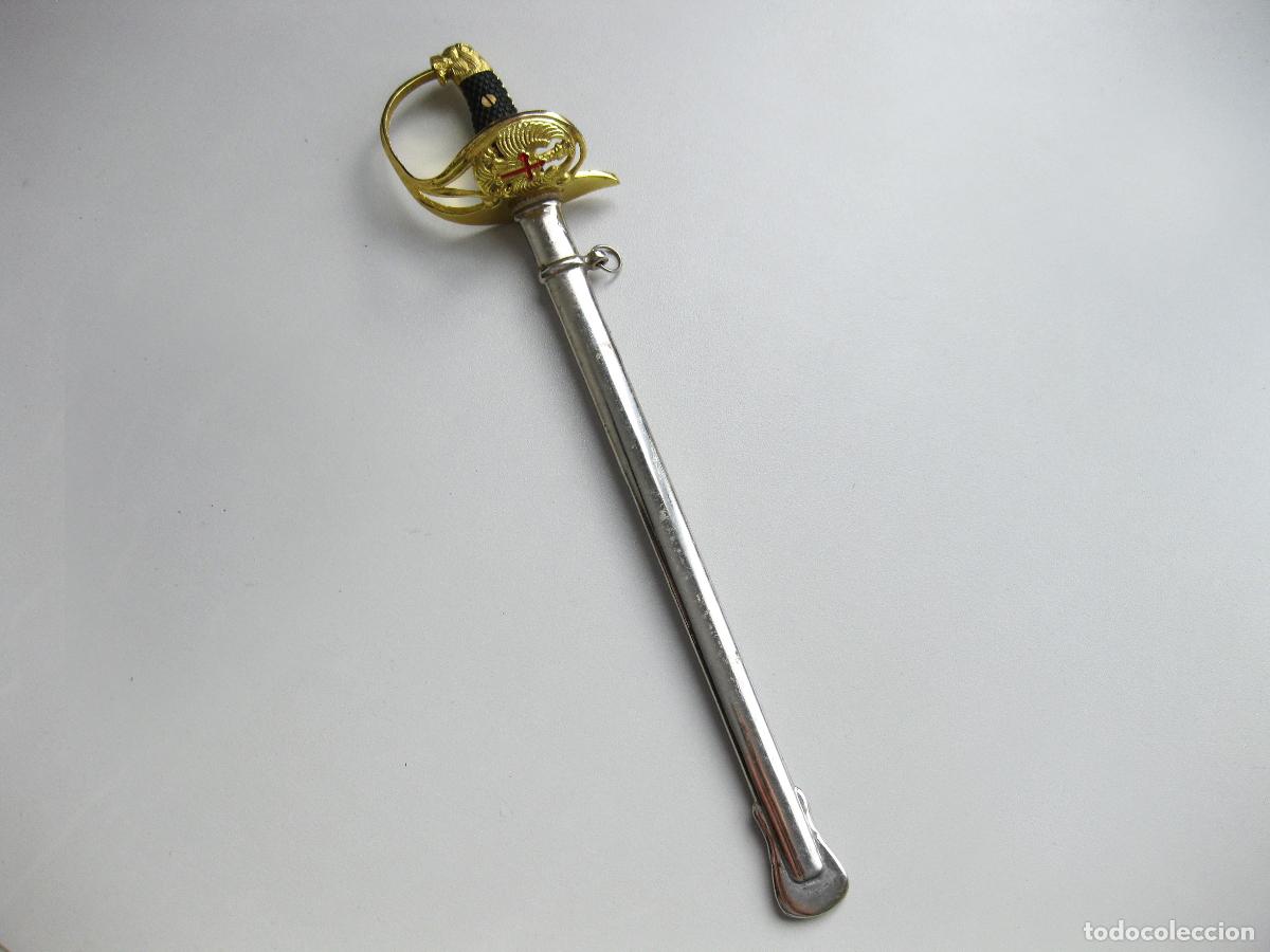 Militaria: ABRECARTAS CON FORMA DE ESPADA O SABLE DEL EJ&Eacute;RCITO ESPA&Ntilde;OL MODELO DE 1943. TIPO PUERTO SEGURO