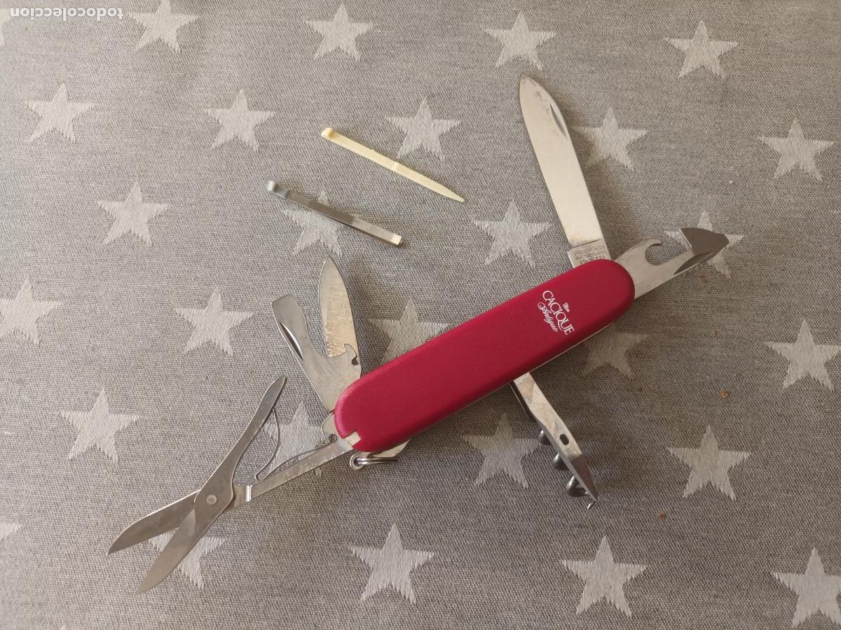 Militaria: MAVAJA MULTIUSOS VICTORINOX OFFICER SUISSE. PUBLICIDAD RON CACIQUE ANTIGUO