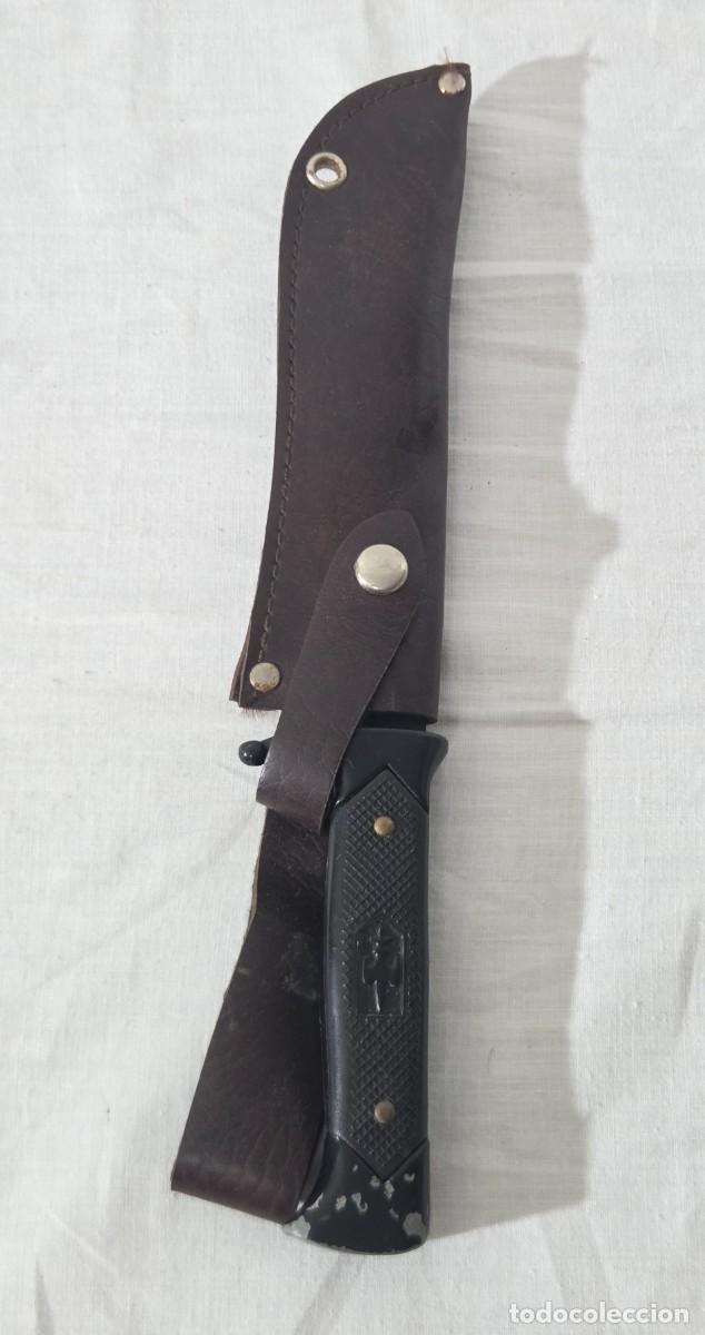 Militaria: Machete con funda de cuero, The last fighter