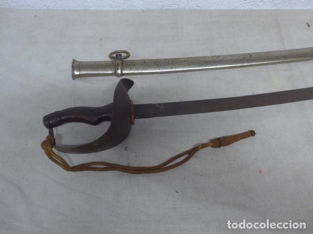 Militaria: Antigua espada sable modelo 1895 de tropa para institutos montados, marcada de Toledo.