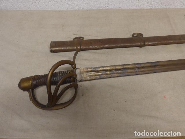 Militaria: Antigua espada de tropa de caballeria de linea modelo 1815, marcado Toledo 1823, con su funda.