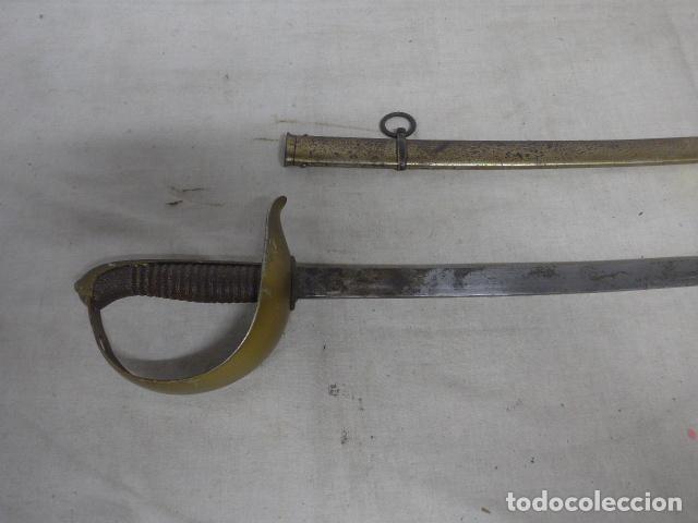 Militaria: Antigua espada sable de oficial de infanteria modelo 1887, marcada Toledo 1897, guerra de cuba.