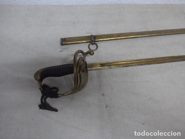 Militaria: Antigua espada del siglo XIX con su funda, a catalogar.