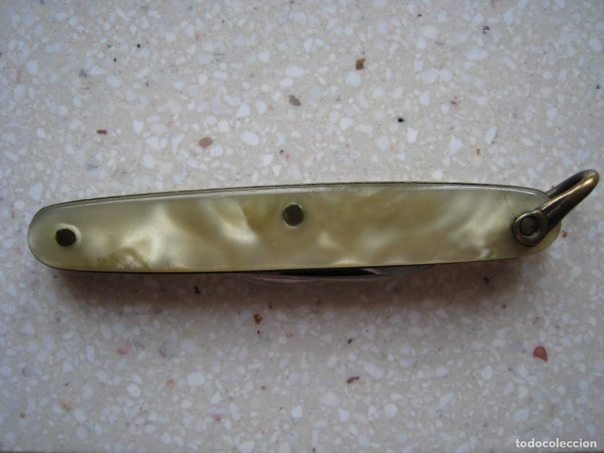 Militaria: Antigua navajita de dos hojas marca Iher