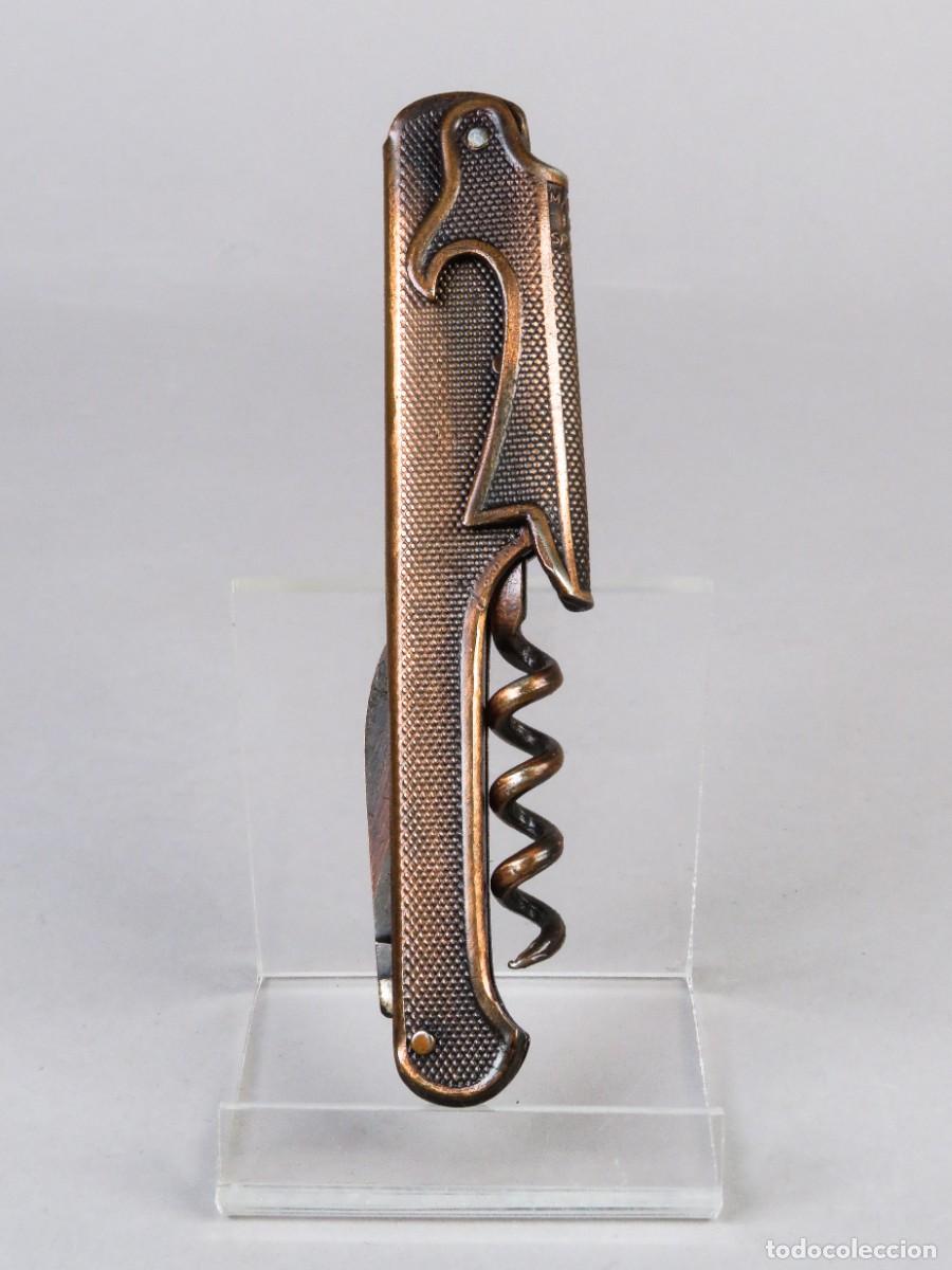 Militaria: Navaja multiusos PAYA con cuerpo acero patinado en cobre siglo XX