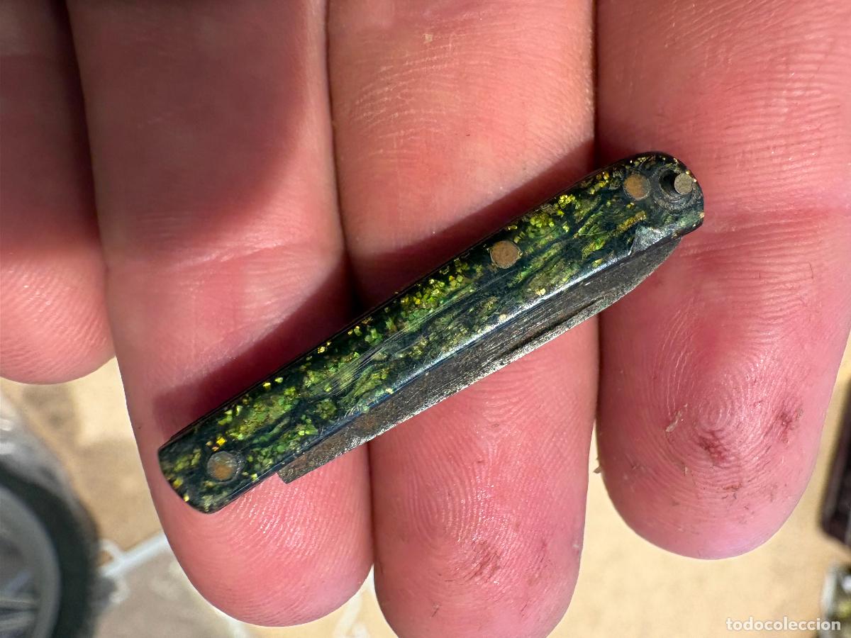 Militaria: Diminuta navaja marcada solingen??