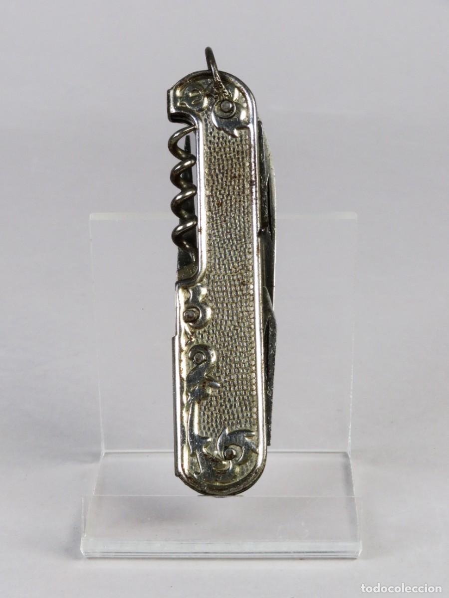 Militaria: Navaja multiusos PAYA IBI cachas met&aacute;licas con relieve floral y sacacorchos siglo XX