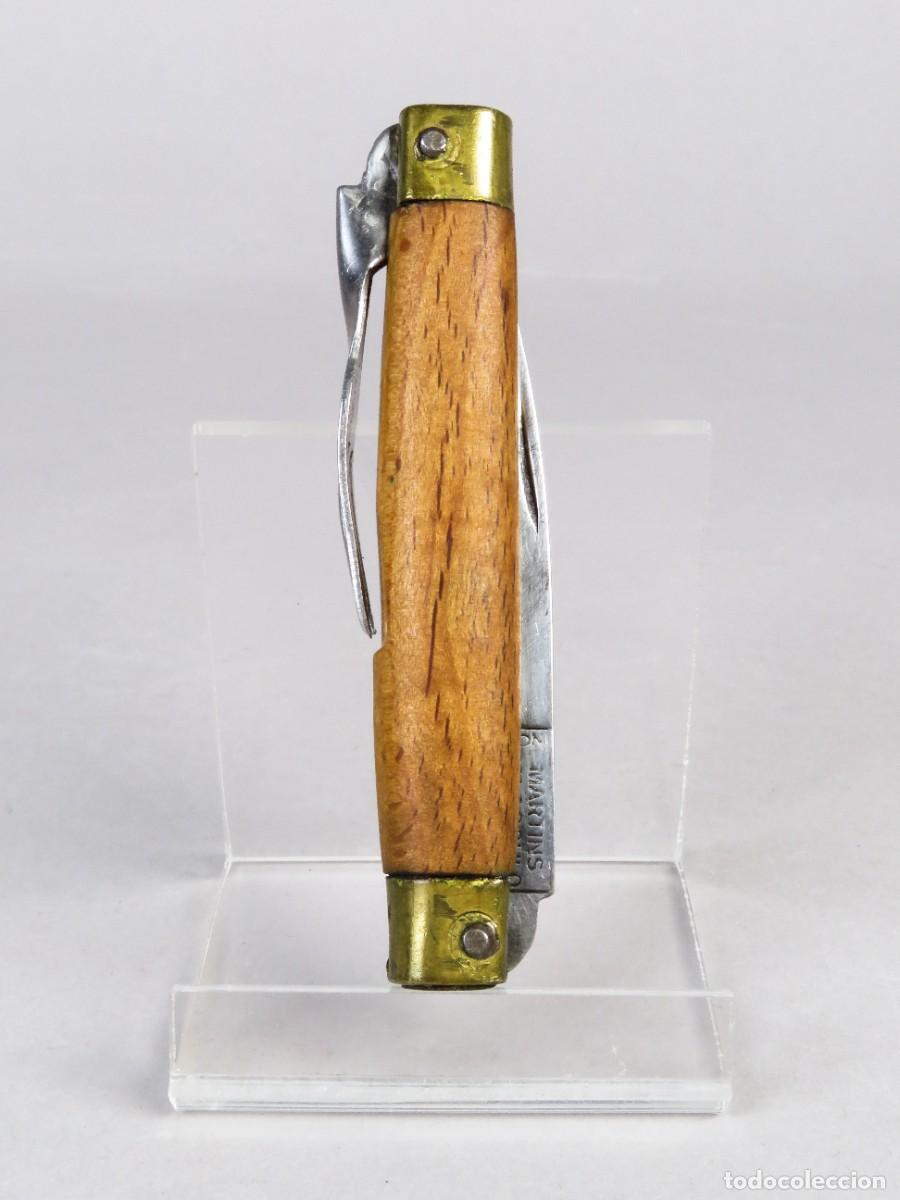 Militaria: Navaja Martins Para&ccedil;oulo con cachas de madera y tenedor siglo XX
