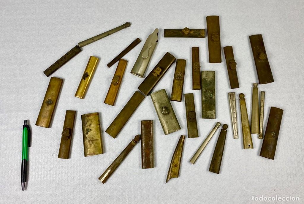 Militaria: Lote de 30 unidades surtidas de Brocal y contera para vaina de cuero de espada Siglo XIX Original 1