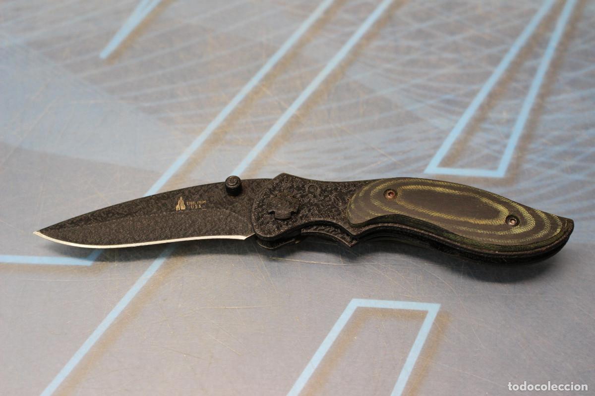Militaria: Navaja negra, cuchillo plegable acero USA.