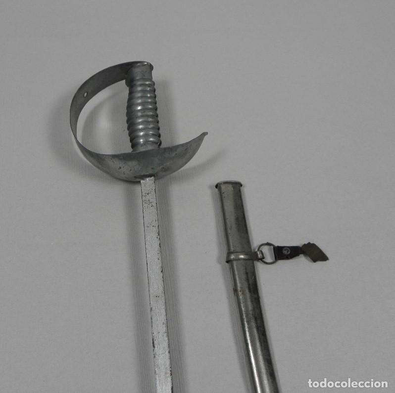 Militaria: Sable infantil a escala del modelo Espa&ntilde;ol para Jefes y Oficiales de Infanter&iacute;a 1887 con guarnici&oacute;n
