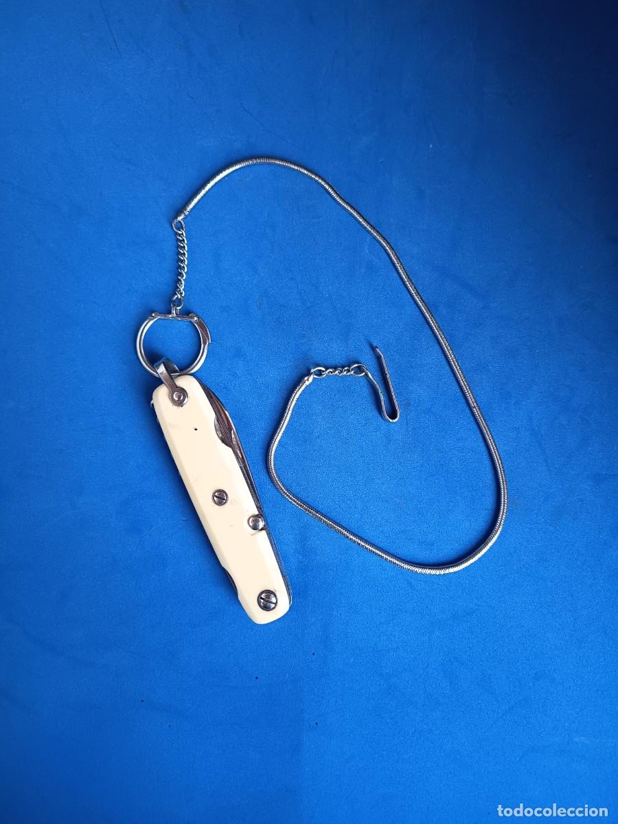 Militaria: Navaja multiusos cachas de hueso