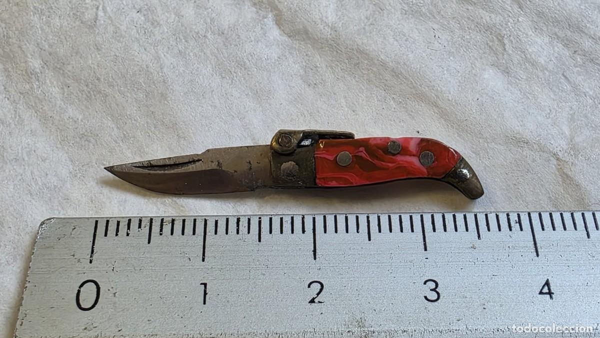 Military Antiques: Navaja, 3,5 cm de longitud total, hoja de 1,5 cm, cachca esmaltada