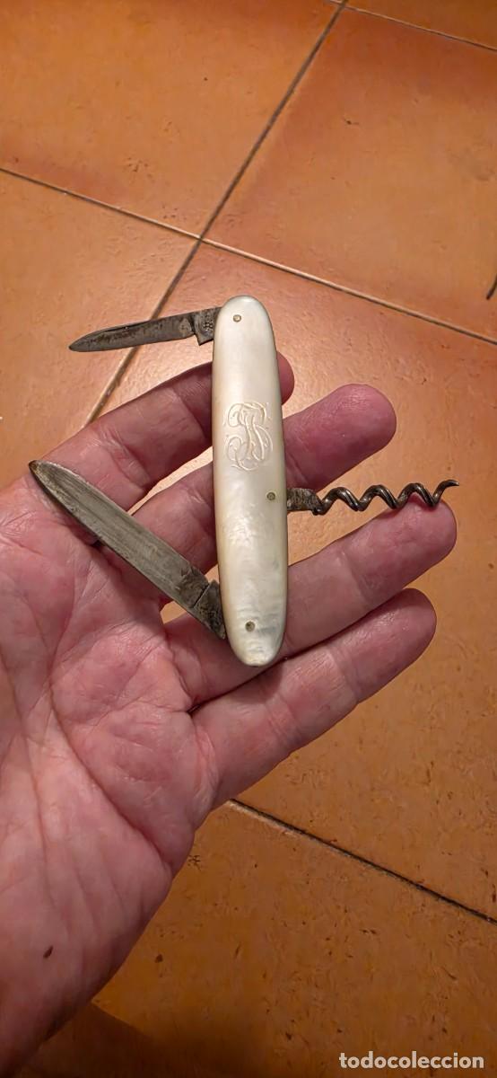 Militaria: Preciosa navaja antigus nacar y multiusos mut antigua