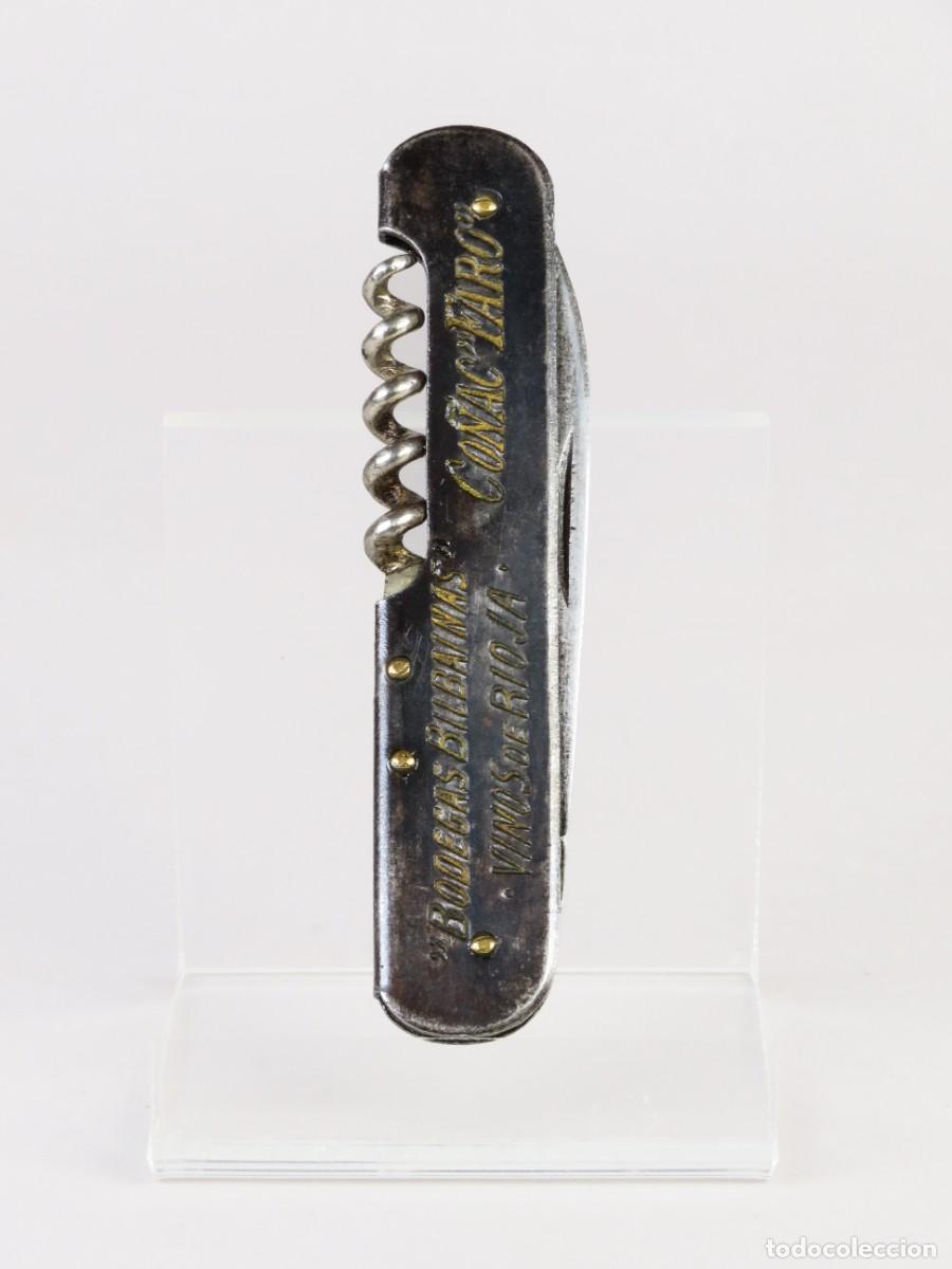 Militaria: Navaja multiusos Solingen de acero publicidad Bodegas Bilba&iacute;nas Vinos de Rioja Co&ntilde;ac Faro a&ntilde;os 20
