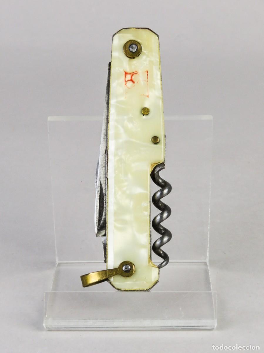 Militaria: Navaja multiusos Pradel de acero y cachas celuloide s&iacute;mil n&aacute;car Francia hacia 1930