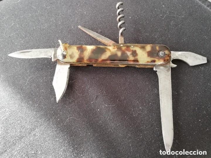 Militaria: ANTIGUA NAVAJA MULTIUSOS CON 6 ACCESORIOS, MANGO DE RESINA TIPO MARMOLADA, MIDE CERRADA 10,5 CMS Y L