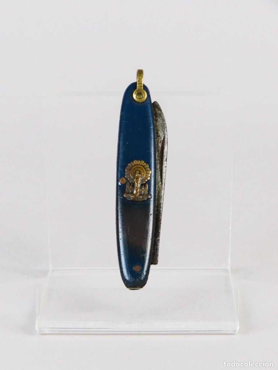 Militaria: Navaja de acero Ibi Paya recuerdo Virgen del Pilar con cachas de celuloide mediados del siglo XX