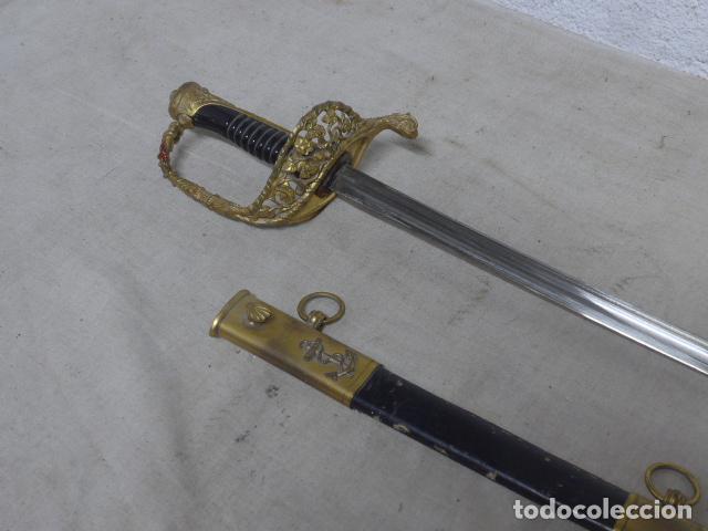 Militaria: Antigua espada francesa de oficial de la marina, original y con su funda. Francia.