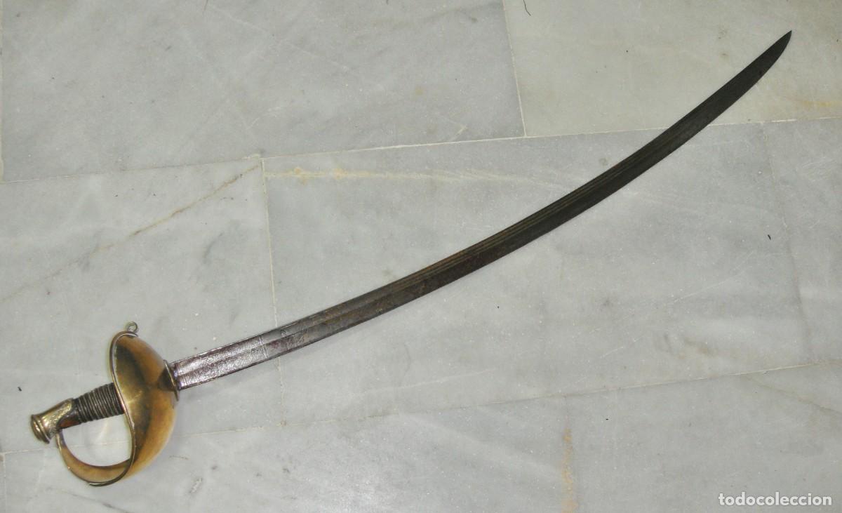Militaria: Sable de caballer&iacute;a con guarnici&oacute;n de lat&oacute;n y hoja curva &middot; Espa&ntilde;a &middot; ca. 1820&ndash;1860