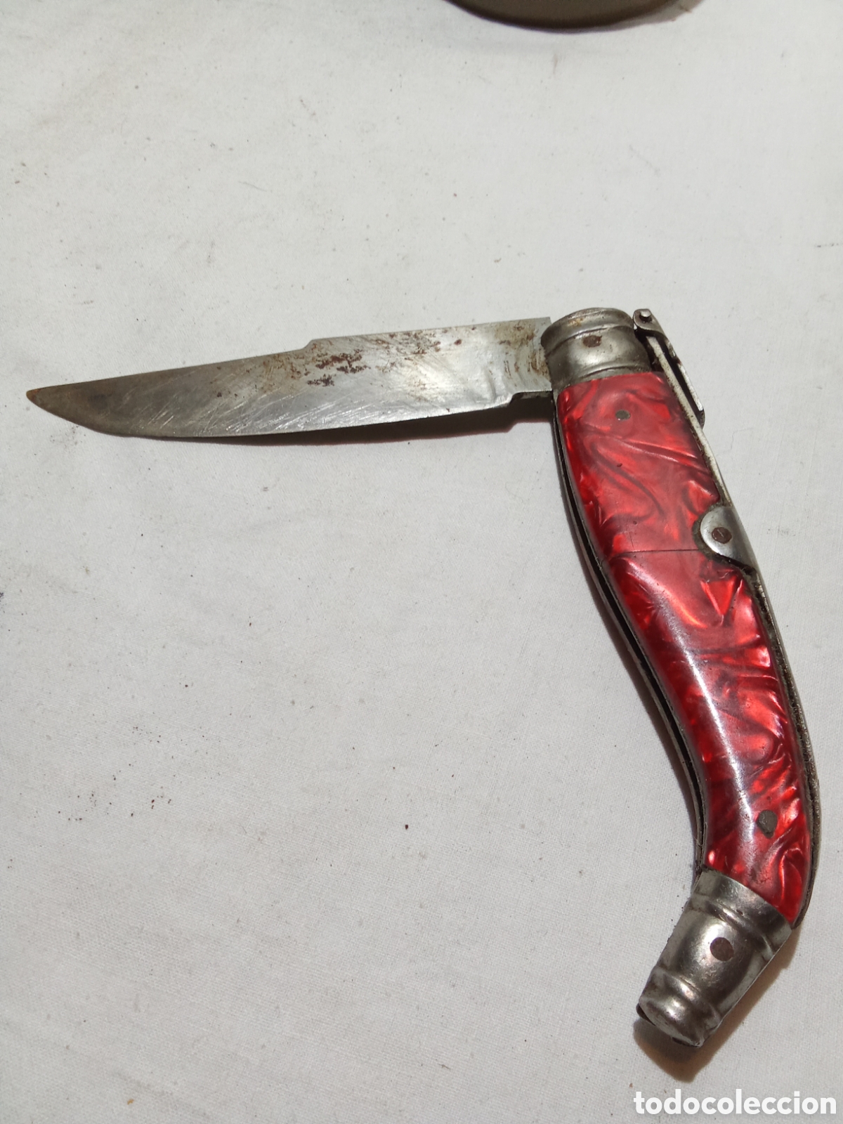 Militaria: NAVAJA CON MANGO ROJO