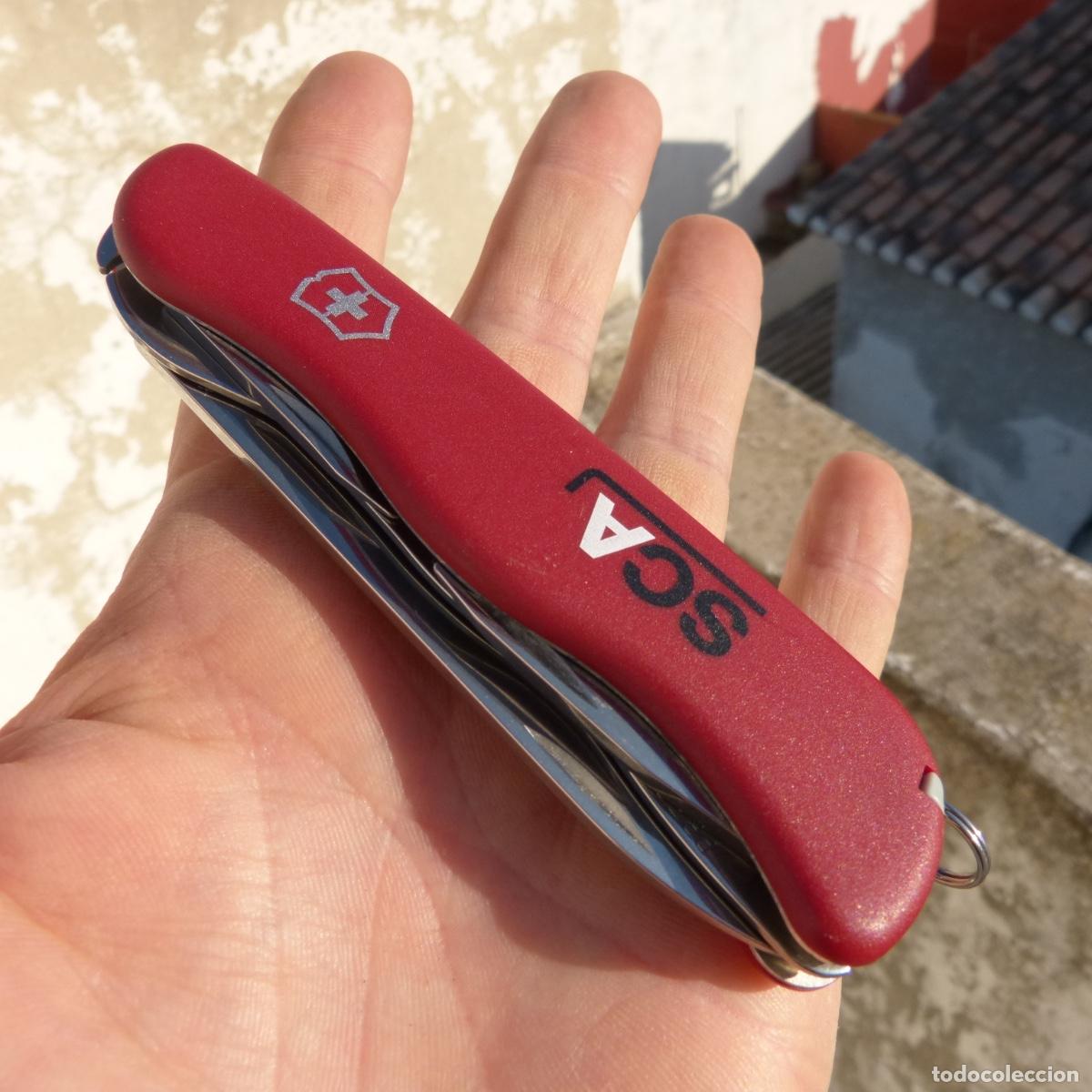 Militaria: Navaja multiusos victorinox con publicidad SCA, practicamente sin uso. Abierta 19,5cm, 105gr.