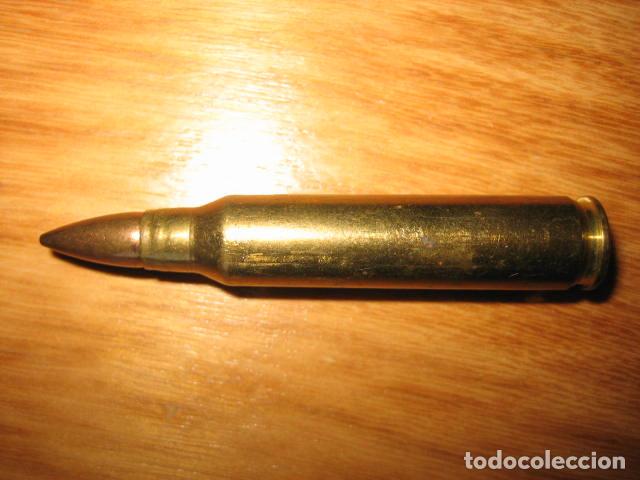 Militaria: cartucho 5,56 inerte. - Foto 1