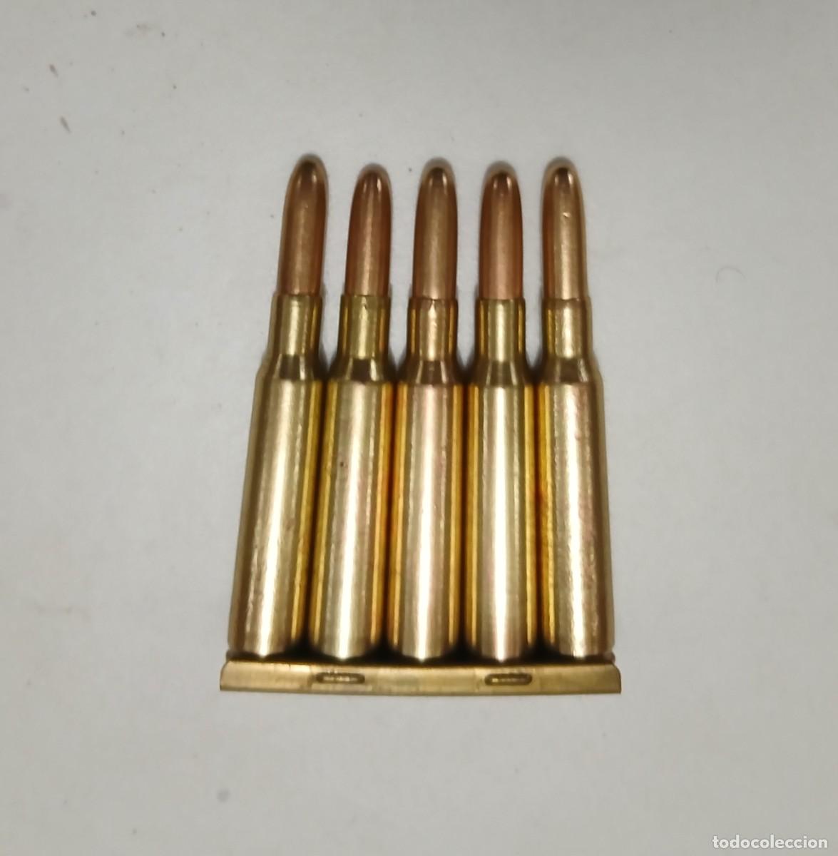 Militaria: Peine INERTE con 5 cartuchos vaina percutida 7x57 Mauser Guerra Civil. Marcaje FN 19 T 35.