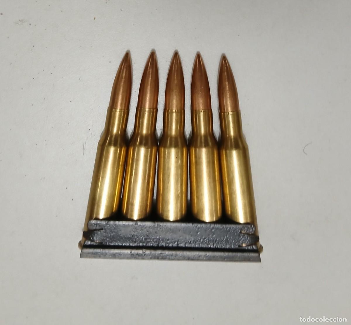 Militaria: Peine ruso con 5 cartuchos INERTES y percutidos 7,62 mm Mosin Nagant. Guerra Civil.