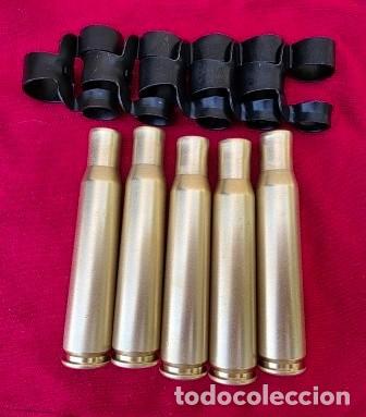 Militaria: CINCO CASQUILLOS CON ESLABONES DE AMETRALLADORA 12,7X99 BROWNING