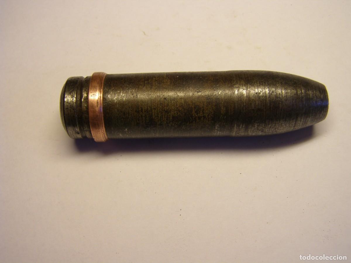Militaria: Proyectil calibre 20 mm. oerlikon, Guerra Civil Espa&ntilde;ola, macizo. INERTE.
