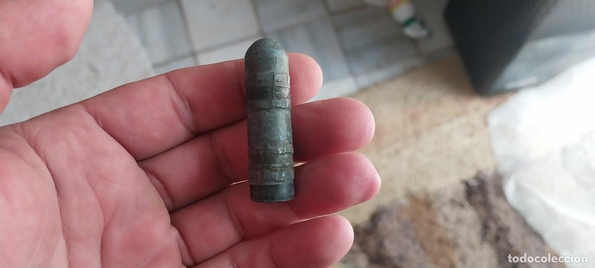 Militaria: RARA PUNTA DE BALA MIRAR FOTOS