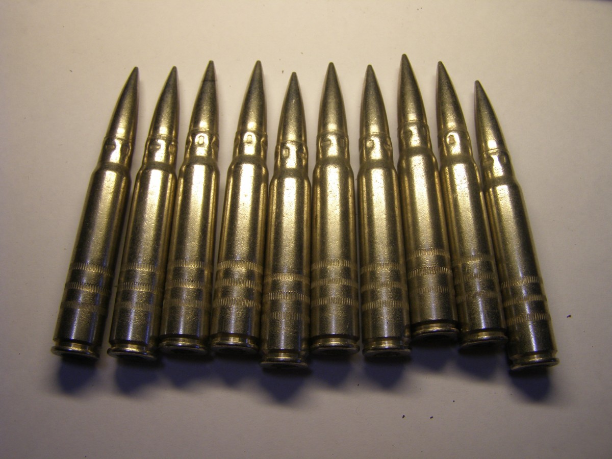 Militaria: 10 cartuchos de calibre 7.92 x 57 mm. Mauser, de instrucci&oacute;n, INERTES.