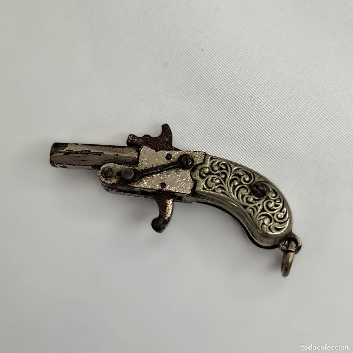 Militaria: MINI PISTOLA DE FULMINANTES, MIDE 4cm.