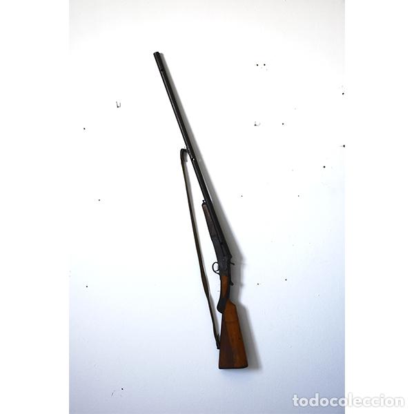 Militaria: Escopeta decorativa con culata de madera