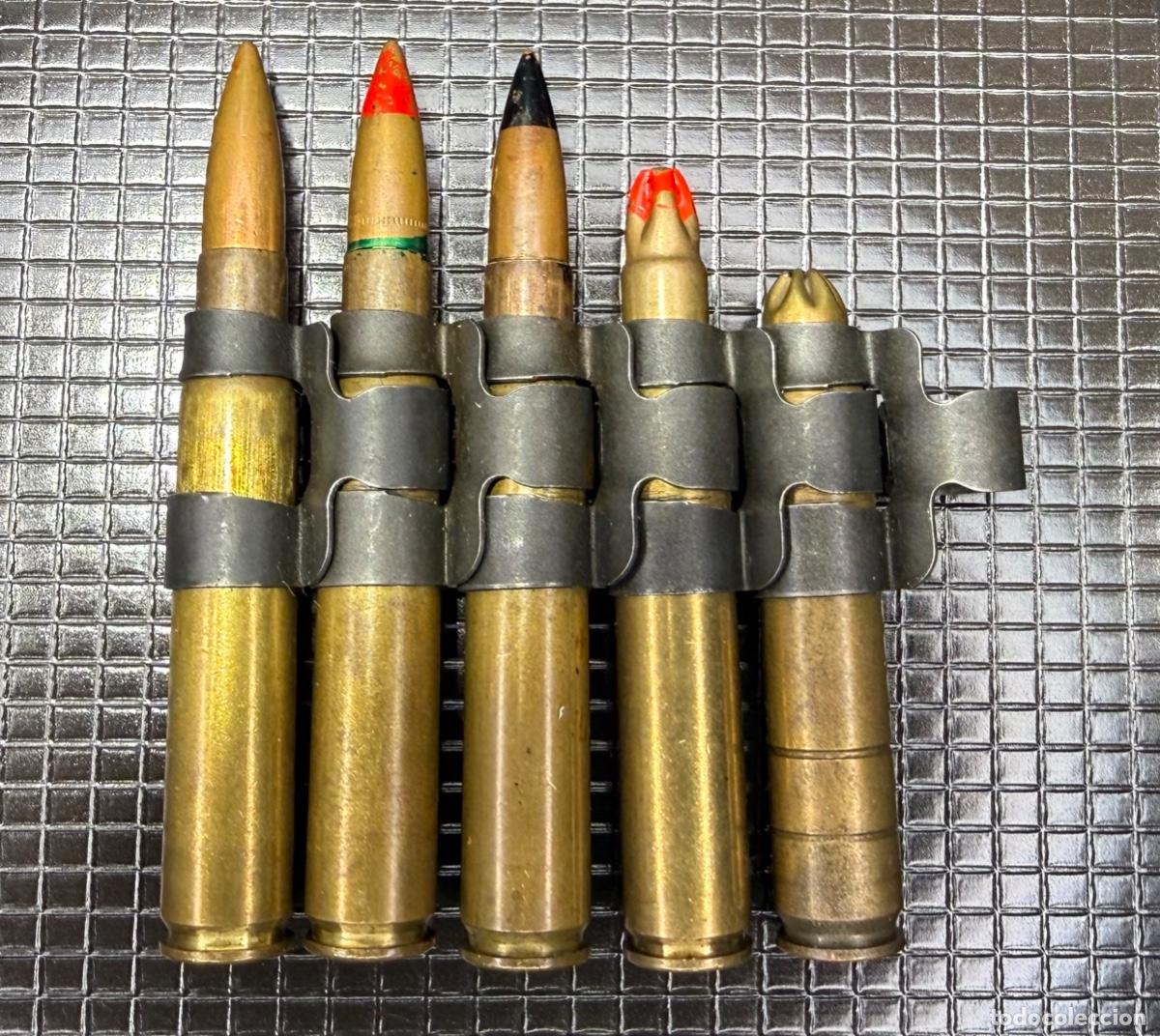 Militaria: Cinta 5 cartuchos calibre 30.06 diferentes, Ordinario, trazador, perforante, 2 de salva. Inerte