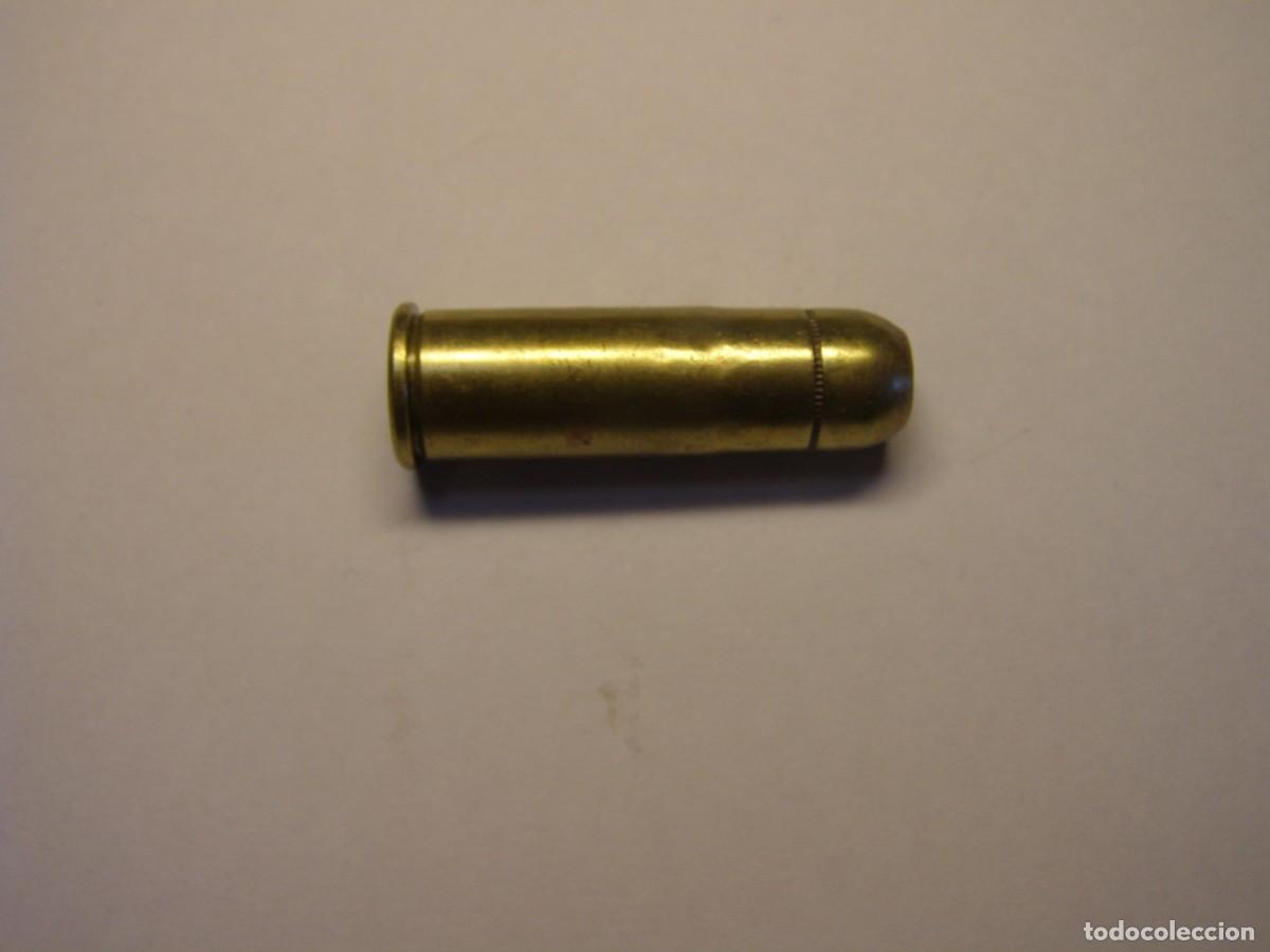 Militaria: Cartucho inerte calibre 44-40 de fogueo.