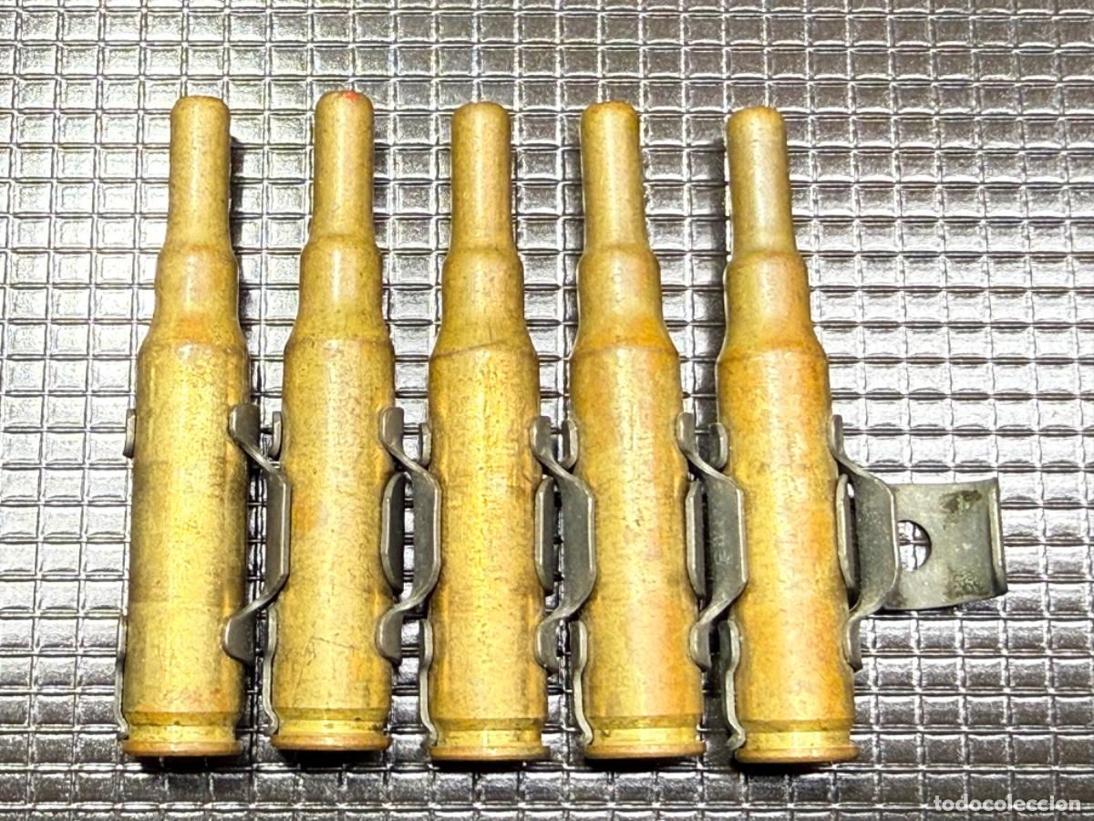 Militaria: 7,62X51 Cinta con 5 cartuchos de fogueo US Inerte para colecci&oacute;n.