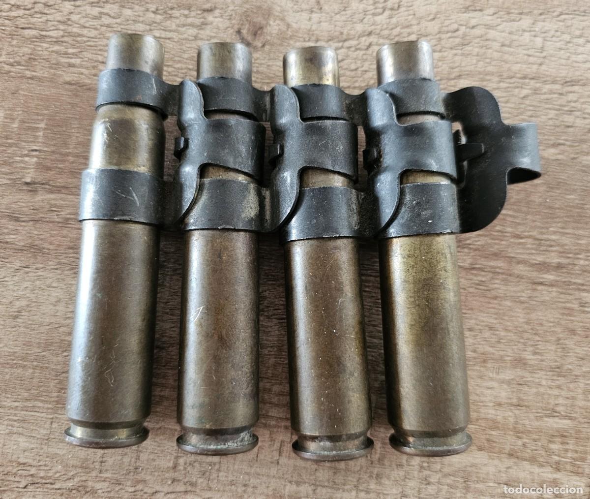 Militaria: Casquillos de bala (4) 12.7x99mm Browning fabricados en 1944 cinta de Santa Barbara