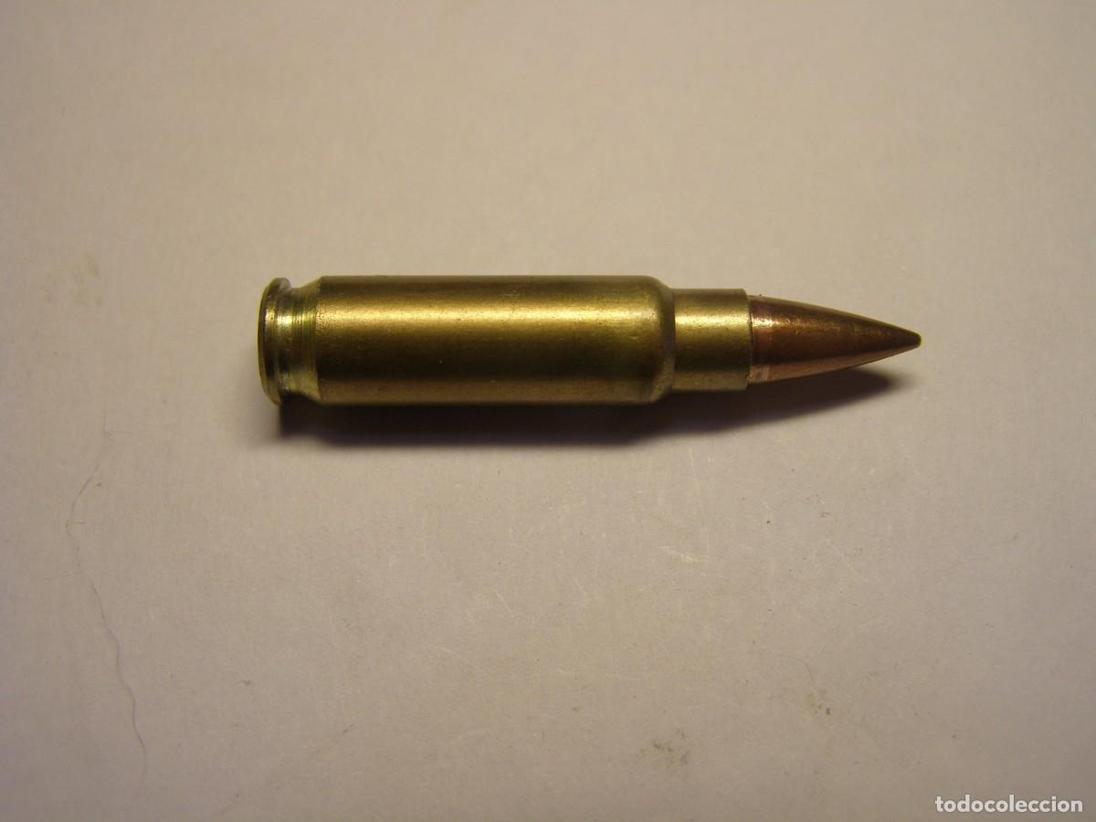 Militaria: Cartucho inerte calibre 5.7 x 28.